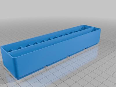 26 AAA / 10 AA Battery holder in a Gridfinity bin
