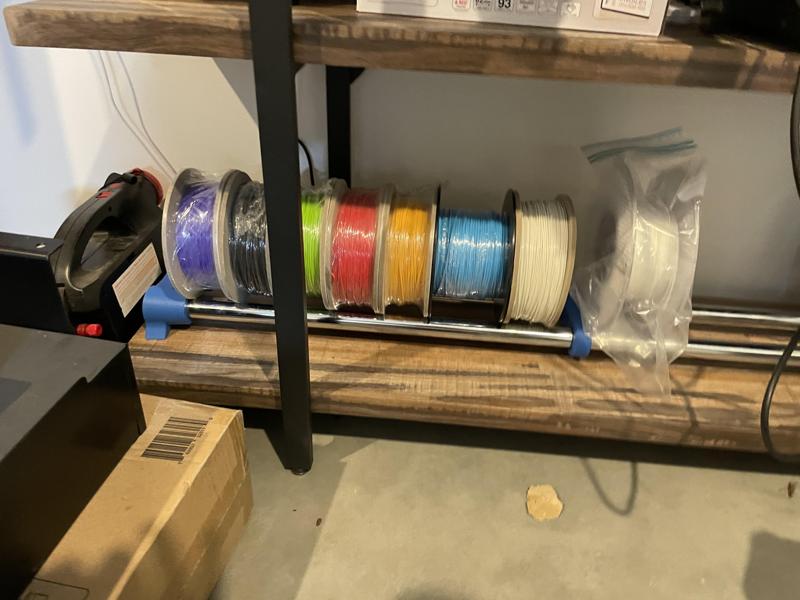 Filament storage rail