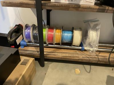 Filament storage rail