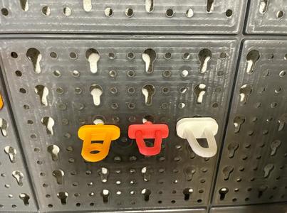 Pegboard hooks perforated tool panel keyhole-shaped slots   