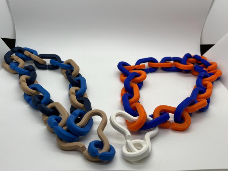 Chain link and connector for oversized logo