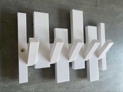 Wall hanger with 5 pins