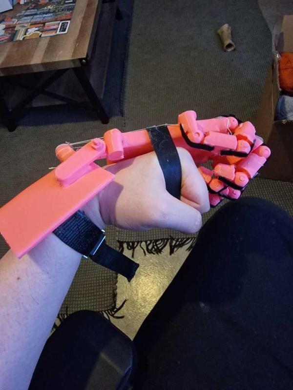 Wrist actuated prosthetic revisited