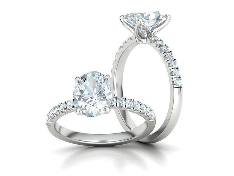 Engagement Solitaire Ring with 9x7mm Oval stone Claw Setting