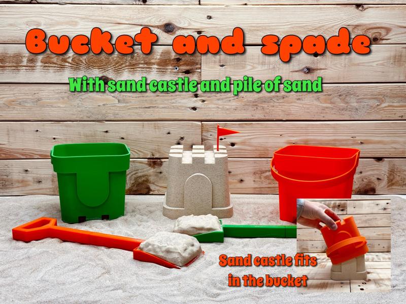 Bucket and spade with sand castle