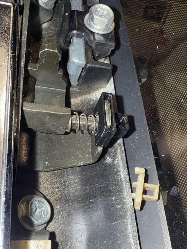 Z31 T-top button restraint
