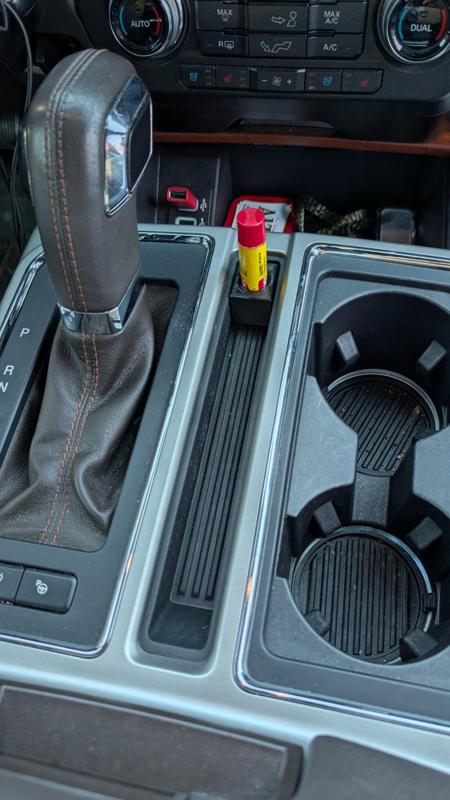 Center console vertical chapstick holder