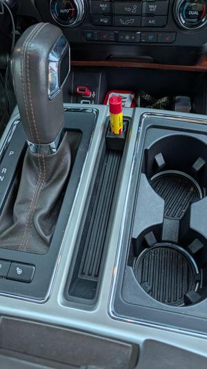 Center console vertical chapstick holder