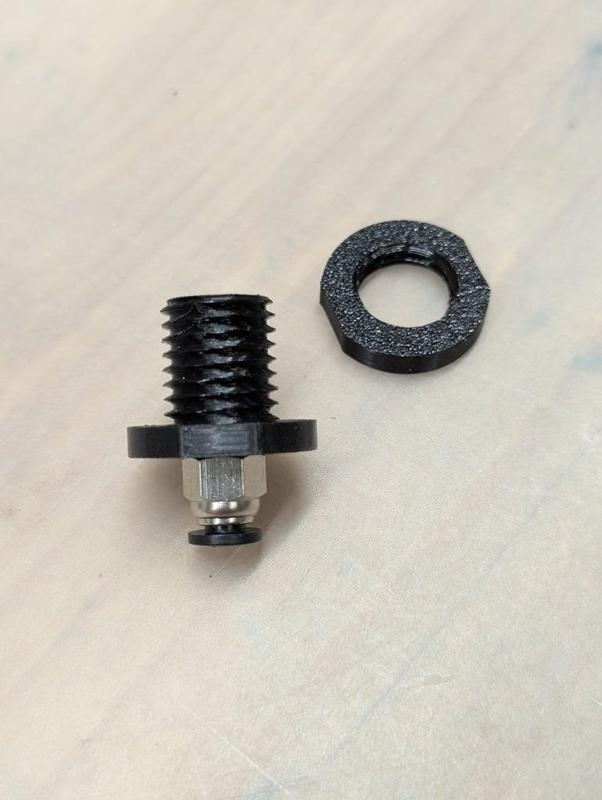 lightweigt filament passthrough with detachable tube fitting for storage