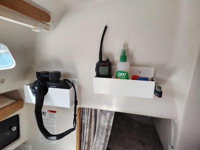 Wall-mounted holster for Steiner 7x50 binoculars with compass