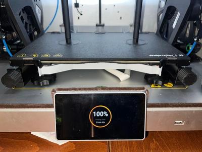 Front load spool holder with right-angle gear drive for front panel adjustment