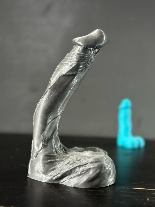 Thin long and curved penis