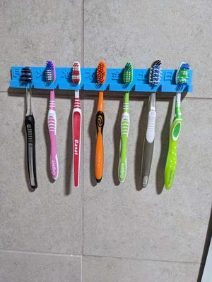 Weekly toothbrush holder